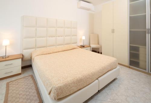 Кровать или кровати в номере Villa Delle Ciliegie