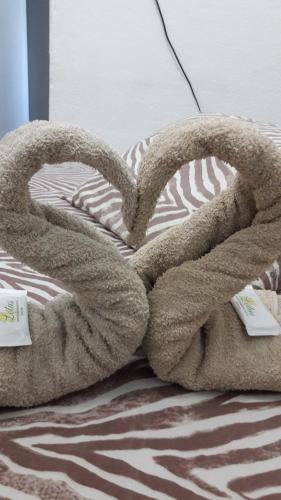 Ένα ή περισσότερα κρεβάτια σε δωμάτιο στο Pousada e Hostel Monalisa