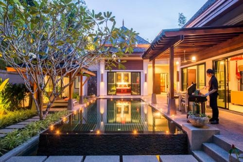 Κήπος έξω από το The Bell Pool Villa Resort Phuket