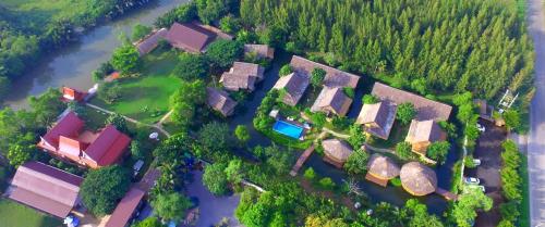 an overhead view of a group of houses and a river at Asita Eco Resort in Amphawa