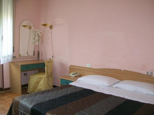Cama o camas de una habitación en Hotel La Rosta