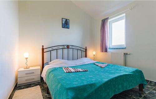 Postel nebo postele na pokoji v ubytování Apartments Ivo 1328