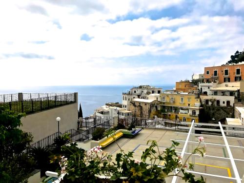 a view of a city with a yellow slide at Villa Yiara in Positano