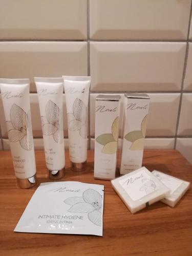 a group of four products sitting on a table at Assaporarte in Florence