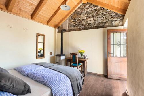 Postel nebo postele na pokoji v ubytování Agriturismo Da Attilio