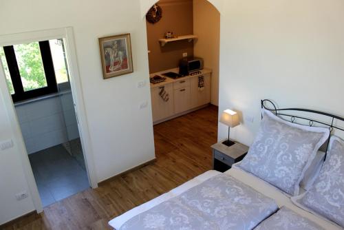 Postel nebo postele na pokoji v ubytování Alta Villa The Countryhouse Adults Only Boutique BnB