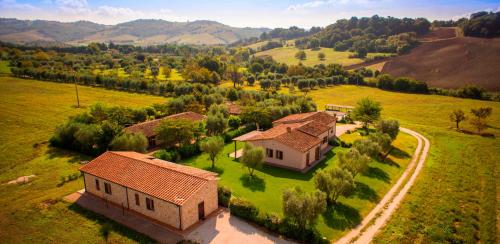 an aerial view of a house in a field at B&B Le Cascatelle di Saturnia in Saturnia