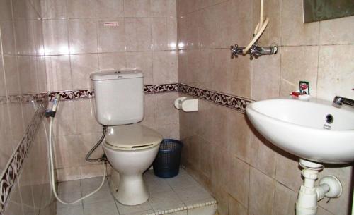 Ванна кімната в Hotel Mitra Garden