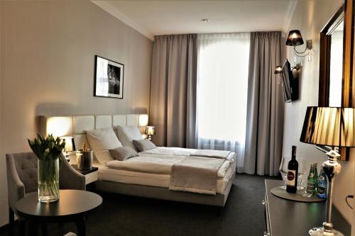 Кровать или кровати в номере Hotel Villa Casino