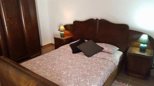 Postel nebo postele na pokoji v ubytování Ti Marquitas