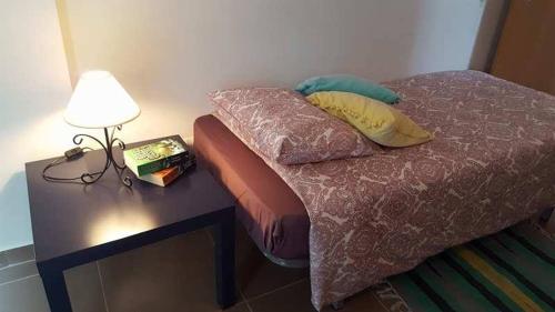 Postel nebo postele na pokoji v ubytování Ti Marquitas