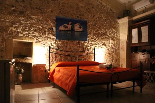 Säng eller sängar i ett rum på Antica Dimora del Salento