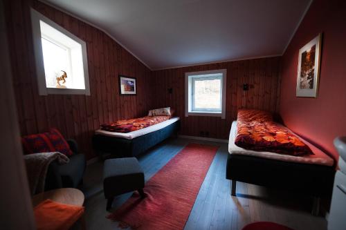 Postelja oz. postelje v sobi nastanitve Sæterstad Gård