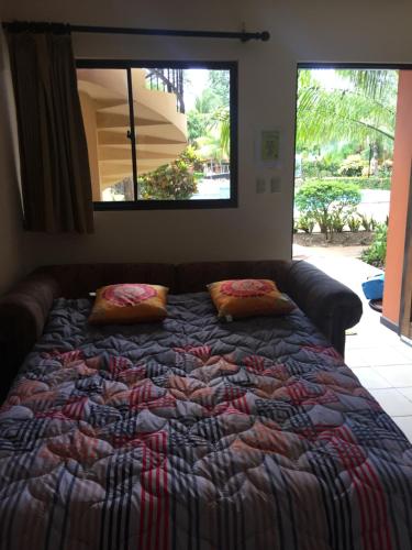 Ein Bett oder Betten in einem Zimmer der Unterkunft CocoMarindo