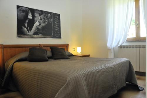 Postel nebo postele na pokoji v ubytování Hotel Il Casale
