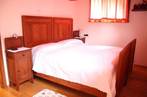 Ένα ή περισσότερα κρεβάτια σε δωμάτιο στο B&B La Borma di Pombo
