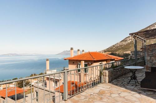 a view of the ocean from a house at Epidavros Seascape in Ancient Epidavros