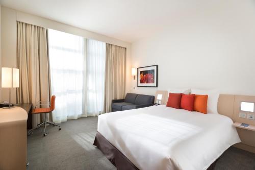 En eller flere senge i et værelse på Novotel Abu Dhabi Al Bustan
