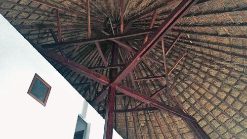 an overhead view of the roof of a building at Le Papayer Écolodge in Boukot Ouolof