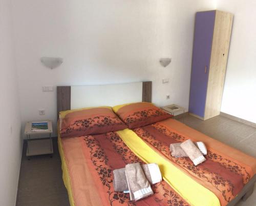 Ένα ή περισσότερα κρεβάτια σε δωμάτιο στο Apartmani B&B