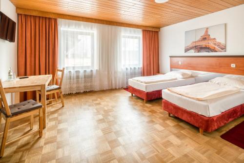 Ένα ή περισσότερα κρεβάτια σε δωμάτιο στο Hotel Bettstadl