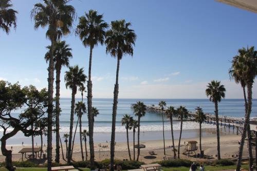 a view of the beach from the balcony at Sea Horse Resort in San Clemente