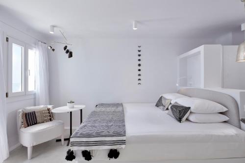 Cama o camas de una habitación en Cosmopolitan Suites - Small Luxury Hotels of the World