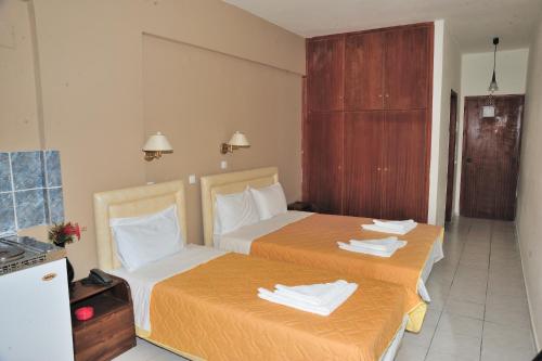 Katil atau katil-katil dalam bilik di Creta Mare Hotel