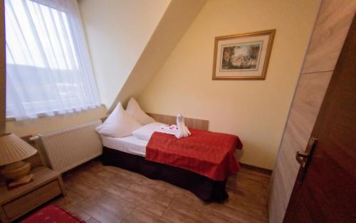 Postel nebo postele na pokoji v ubytování Bukowa Przystań Barlinek