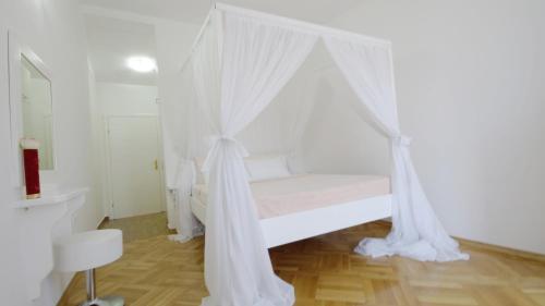 Apartments Miković tesisinde bir odada yatak veya yataklar