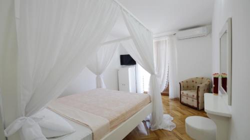 Krevet ili kreveti u jedinici u okviru objekta Apartments Miković