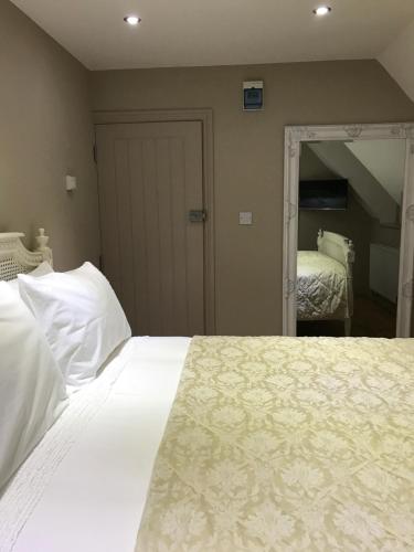 Ein Bett oder Betten in einem Zimmer der Unterkunft The Broad Leys