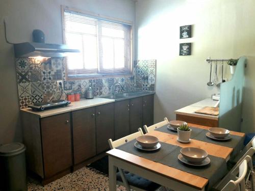 Η κουζίνα ή μικρή κουζίνα στο Anesi Rooms to Rent