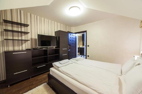 Postel nebo postele na pokoji v ubytování Guest House Vila Bajka