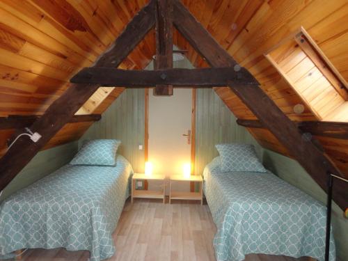 Una cama o camas en una habitación de Gite De Rouffiac