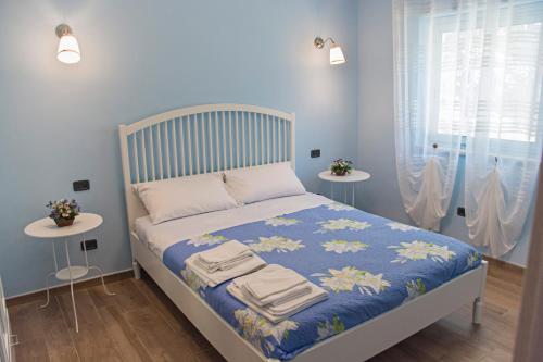 Postel nebo postele na pokoji v ubytování Belvedere Scala dei Turchi