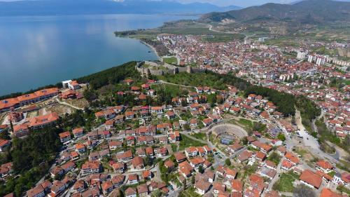 an aerial view of a town next to a body of water at Apartment and Studio Damjan in Ohrid