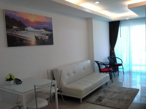 Ruang duduk di Cosy Beach View Apartments