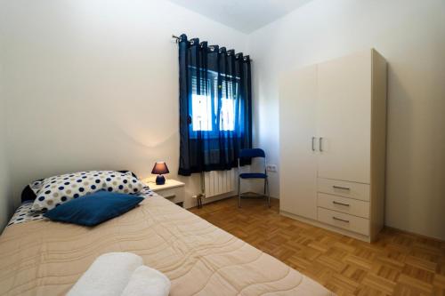 A bed or beds in a room at Apartment Iva