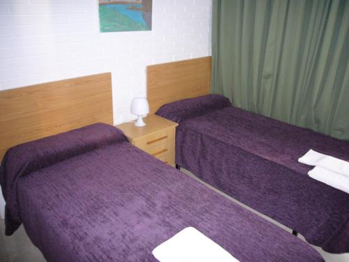 En eller flere senge i et værelse på Ocean 3 - Fincas Arena