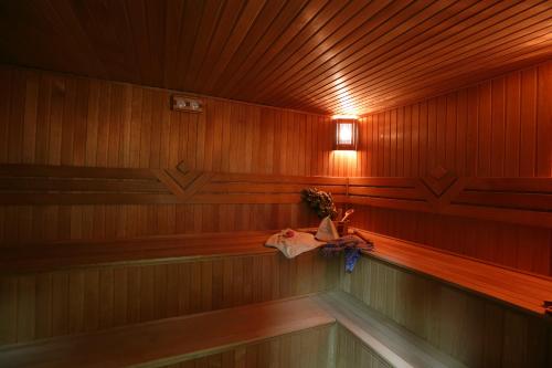 a sauna with a light on the side of it at Days Hotel By Wyndham Baku in Baku