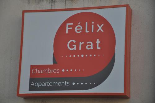 a sign on a wall with the text felix grit at Le Félix Grat - LAVALOC in Laval