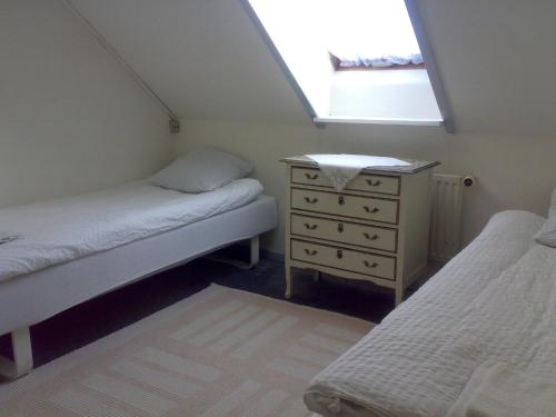 Katil atau katil-katil dalam bilik di Hotel Gedser Apartments