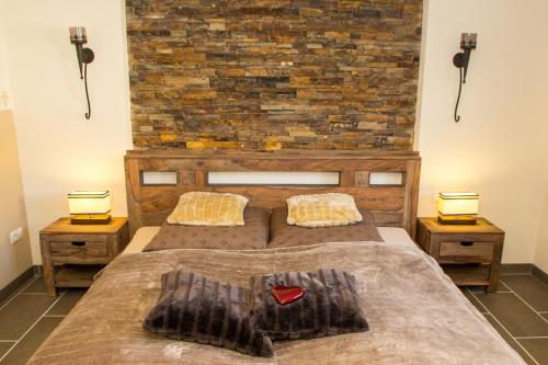 Llit o llits en una habitació de Wildnisresidenz am Nationalpark
