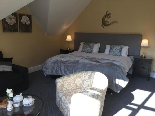 Katil atau katil-katil dalam bilik di Elton Guest House