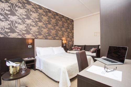 Postel nebo postele na pokoji v ubytování Hotel Lalla Beauty & Relax