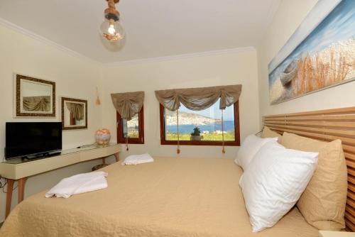 Ένα ή περισσότερα κρεβάτια σε δωμάτιο στο Villa Marenosta