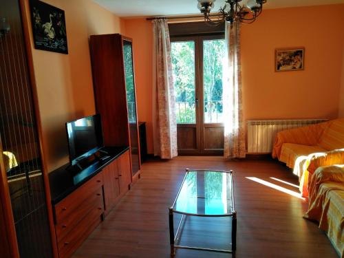 TV a/nebo společenská místnost v ubytování Villaespina