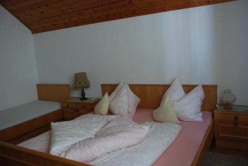 Postel nebo postele na pokoji v ubytování Haus Grundner