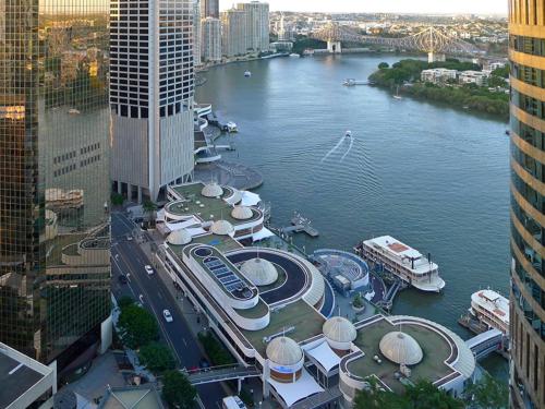 a view of a river in a city with buildings at Felix 374 FF Apartment in Brisbane